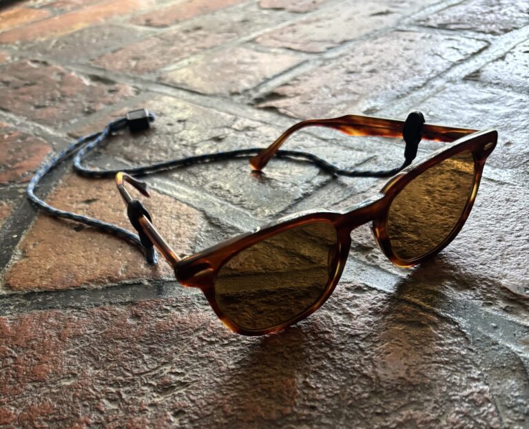 Chums Slip Fit sunglasses strap attached to a pair of sunglasses